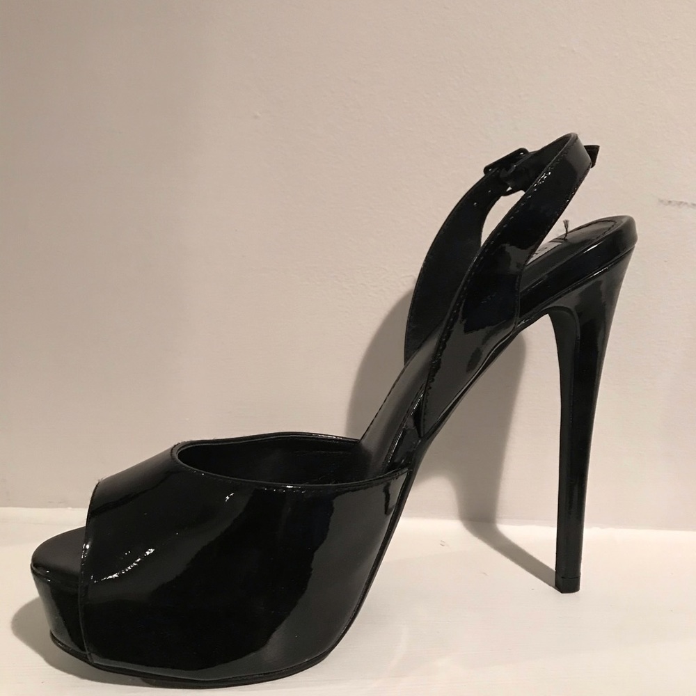 Steve Madden Abrill Black Patent leather heel.